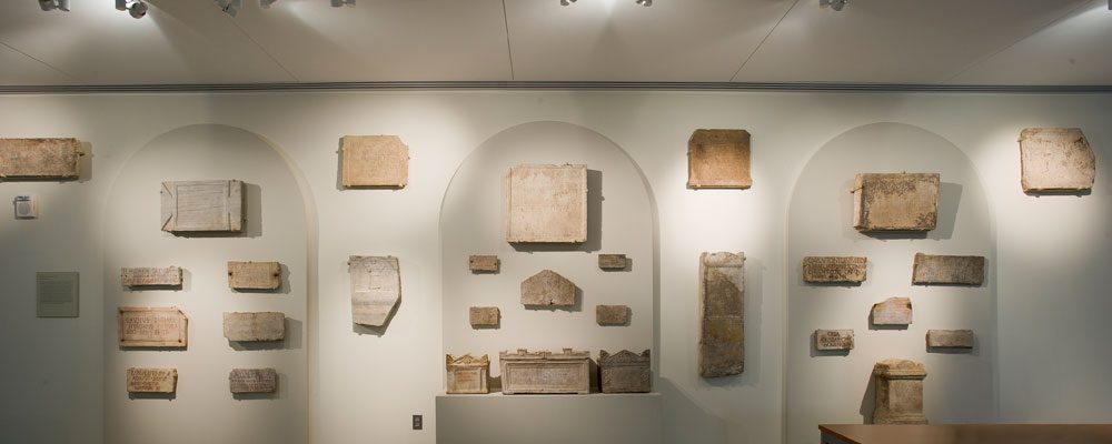 Multiple artifacts displayed on the wall.